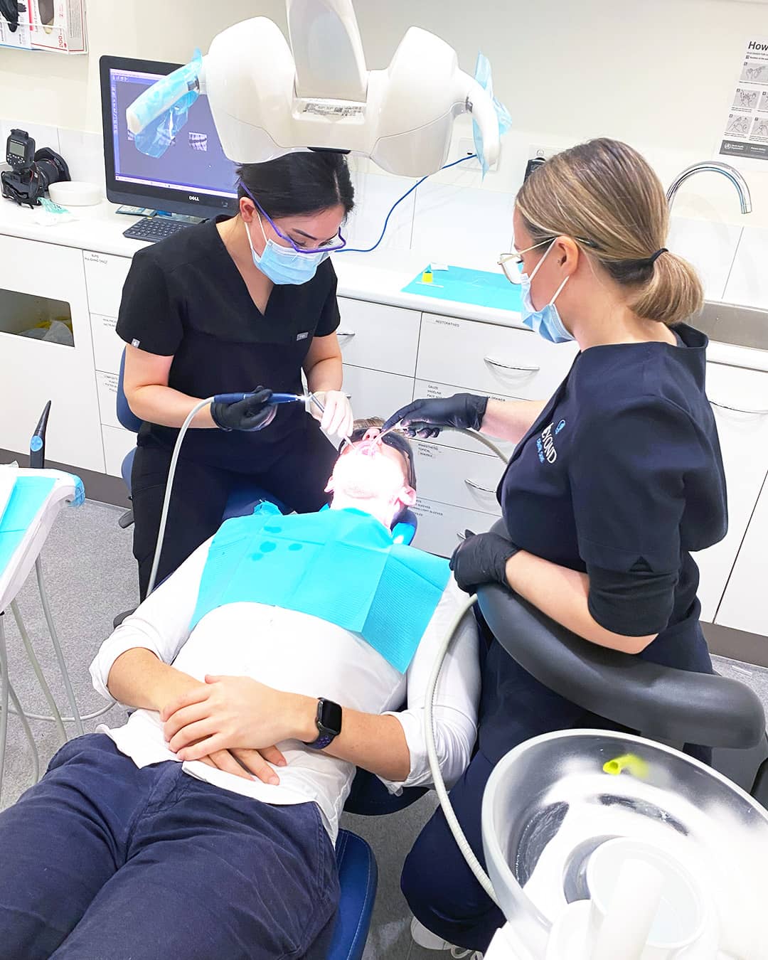 Dr. Sitav Amin preparing a tooth for crown placement.