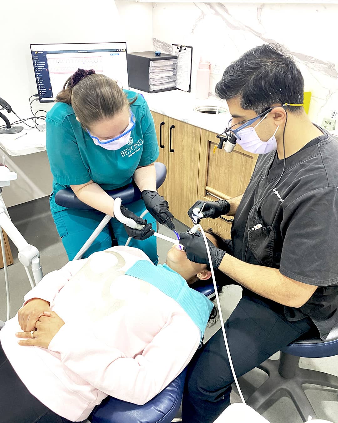 Dr. Mitesh performing dental treatment