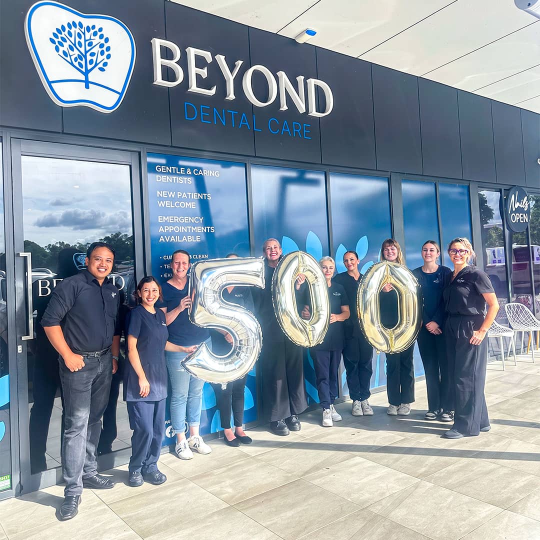 Beyond Dental Care Burpengary team celebrating more than 500 five-star Google reviews
