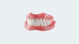 Fed up with uncomfortable dentures problem dental implants Brisbane