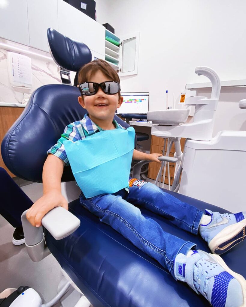 Little boy enjoying dentistry at Beyond Dental Care Little boy enjoying dentistry at Beyond Dental Care
