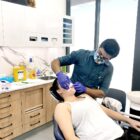 Dr. Mitesh evaluating patient for dental implants
